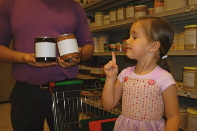 Comparing two products in a store aisle