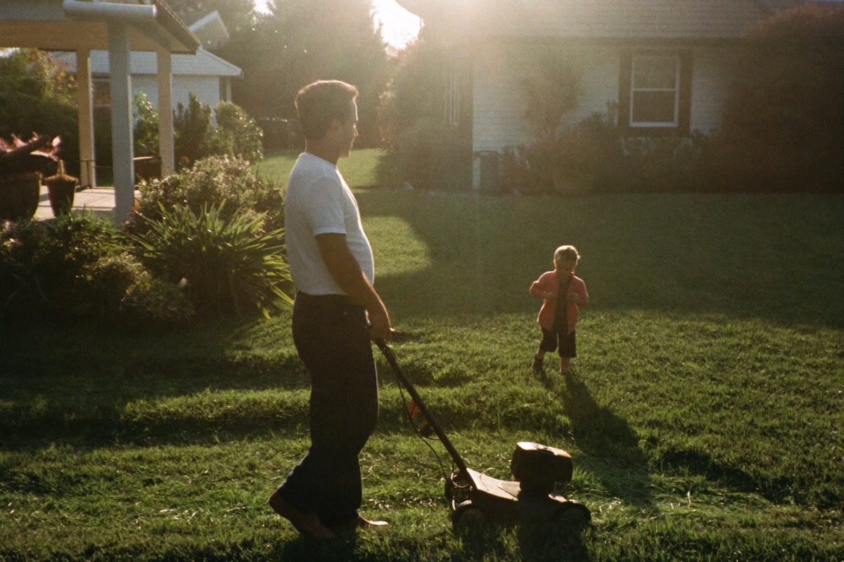 Mowing a lawn at golden hour